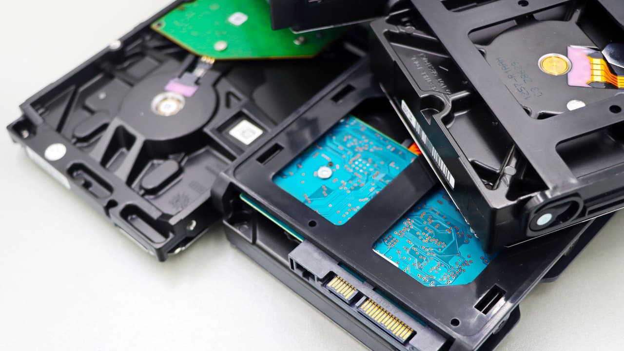 Stock photo: a stack of internal hard disk drives for data storage.