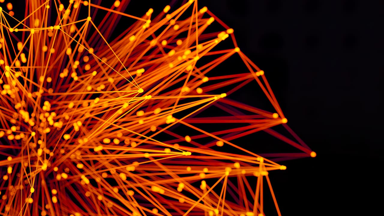 Stock photo: orange lines and dots forming a glowing network pattern.