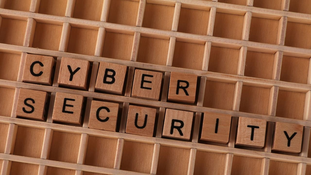 Stock photo: wooden letter blocks spelling the words CYBER SECURITY.